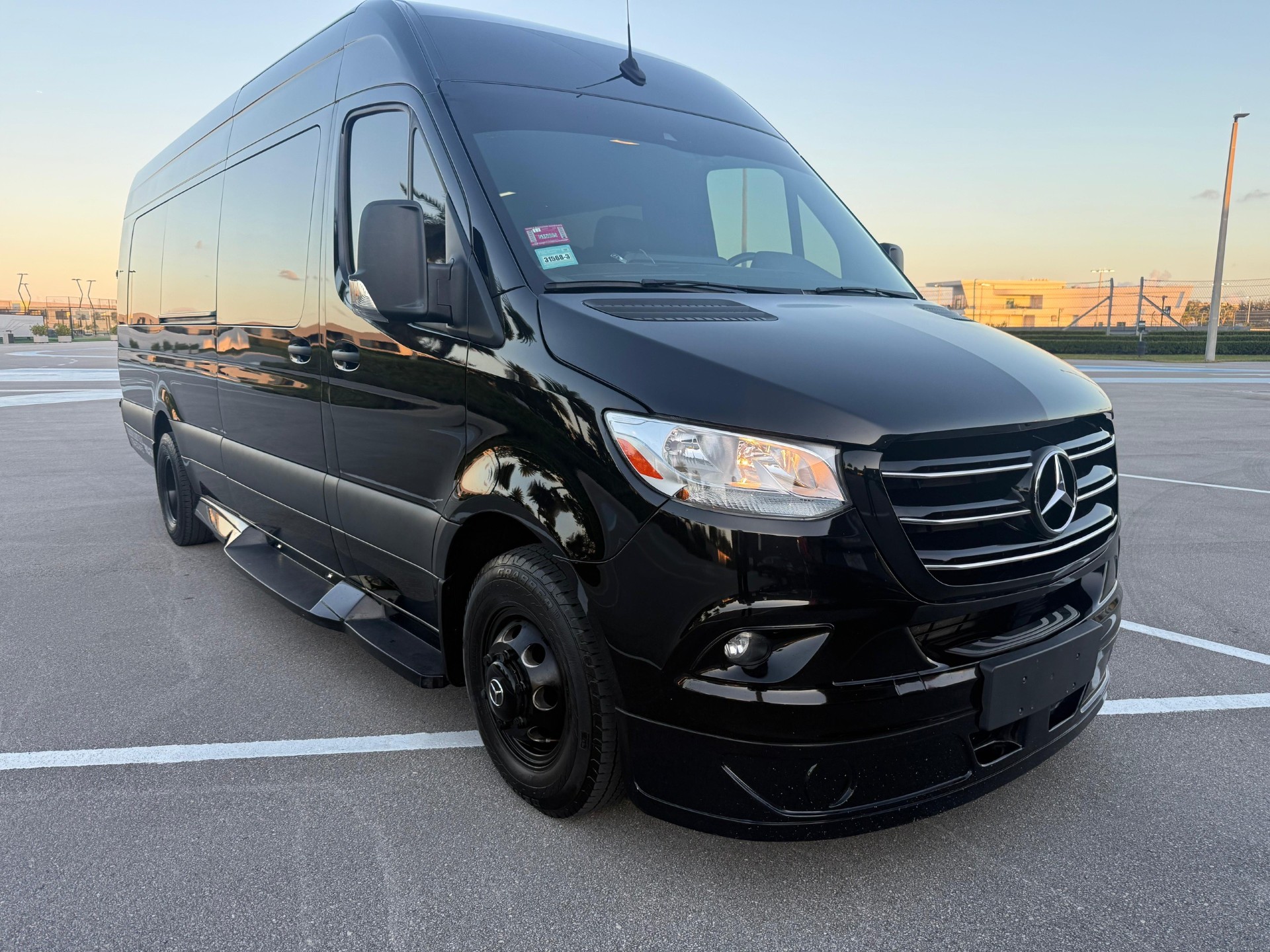 Black Mercedes-Benz Sprinter 11-passenger executive van